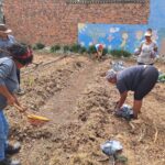 Outreach workers engaging with community members